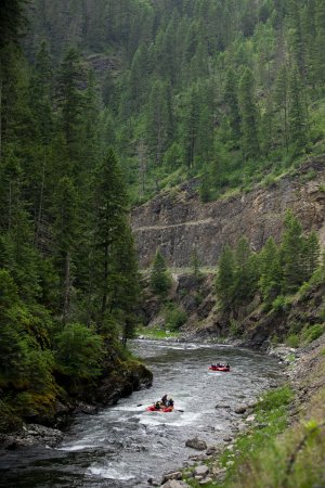 St Joe River landscape with rafters on the river in Northern Idaho