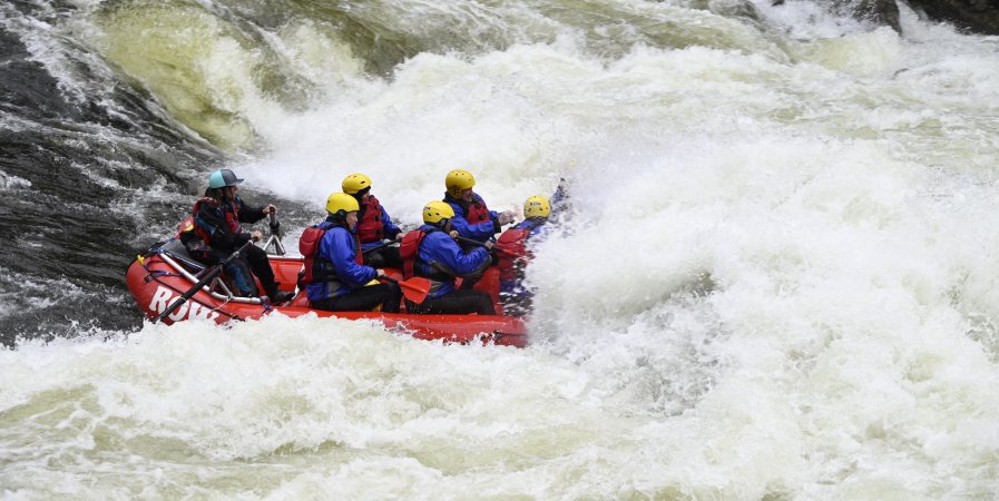 Raft entering a huge whitewater wave on the Lochsa river